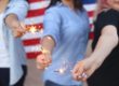 people holding sparklers